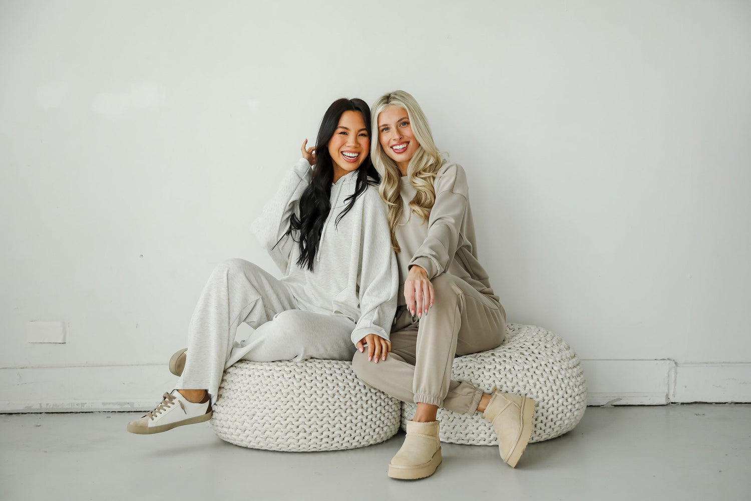 two models wearing cute and comfy matching jogger and pullover sets