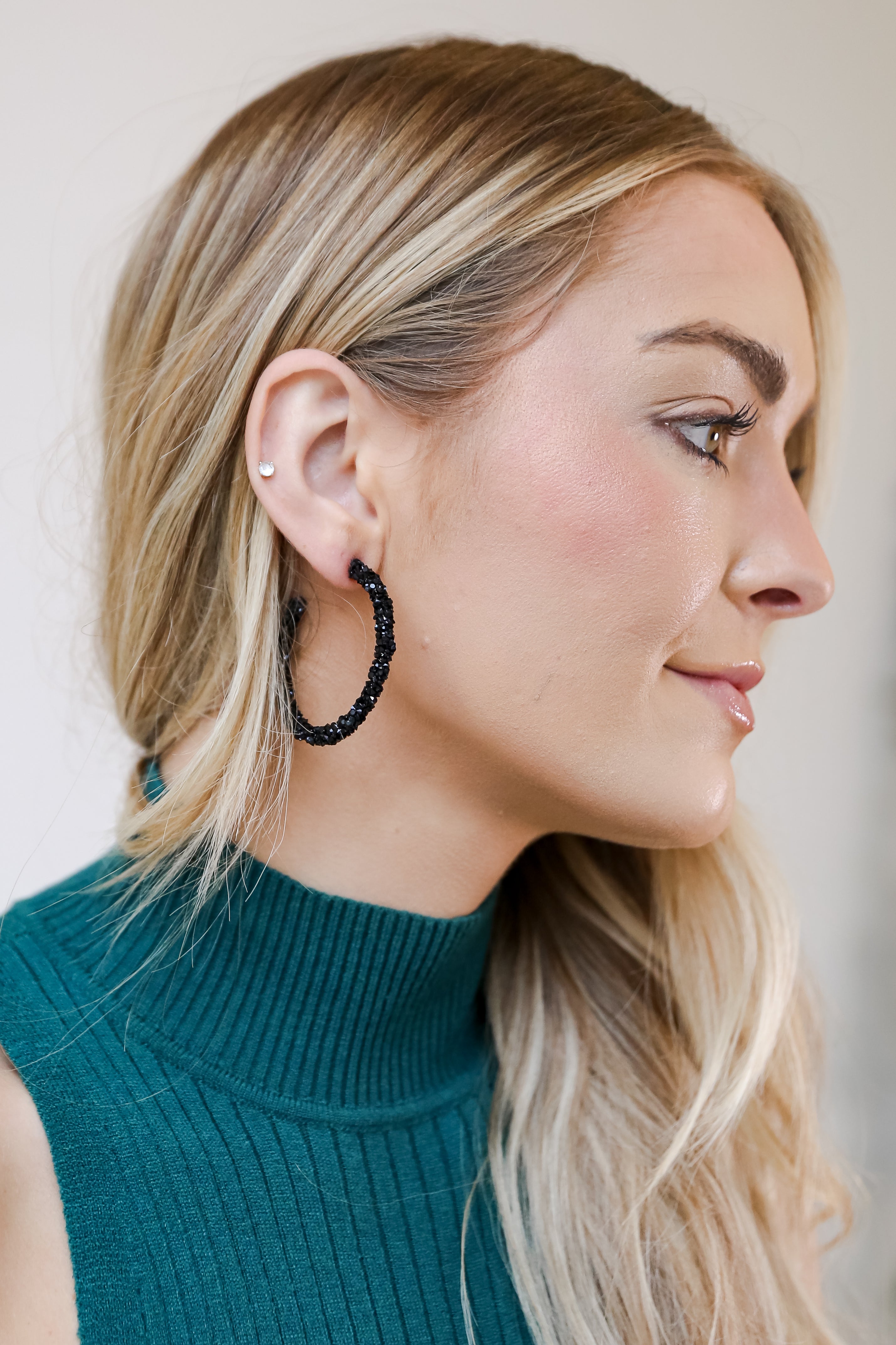 black Beaded Hoop Earrings on model