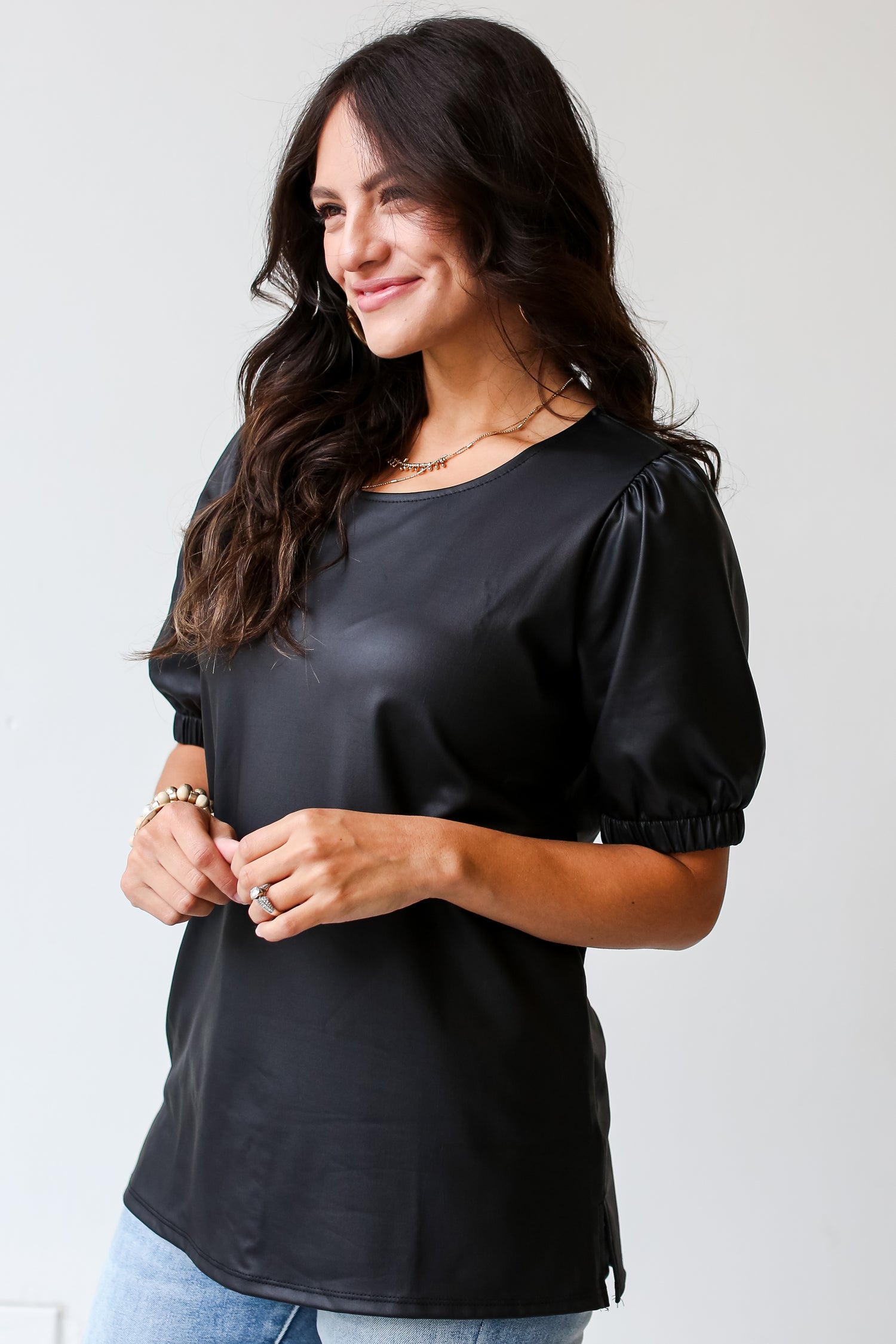 model wearing a Black Puff Sleeve Blouse