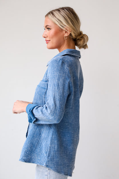 Morgan Denim Linen Button-Up Blouse features, Lightweight Crinkle Linen Fabrication, Acid Washed, Collared Neckline, Functional Button Front long Sleeves with Functional Button Cuffs