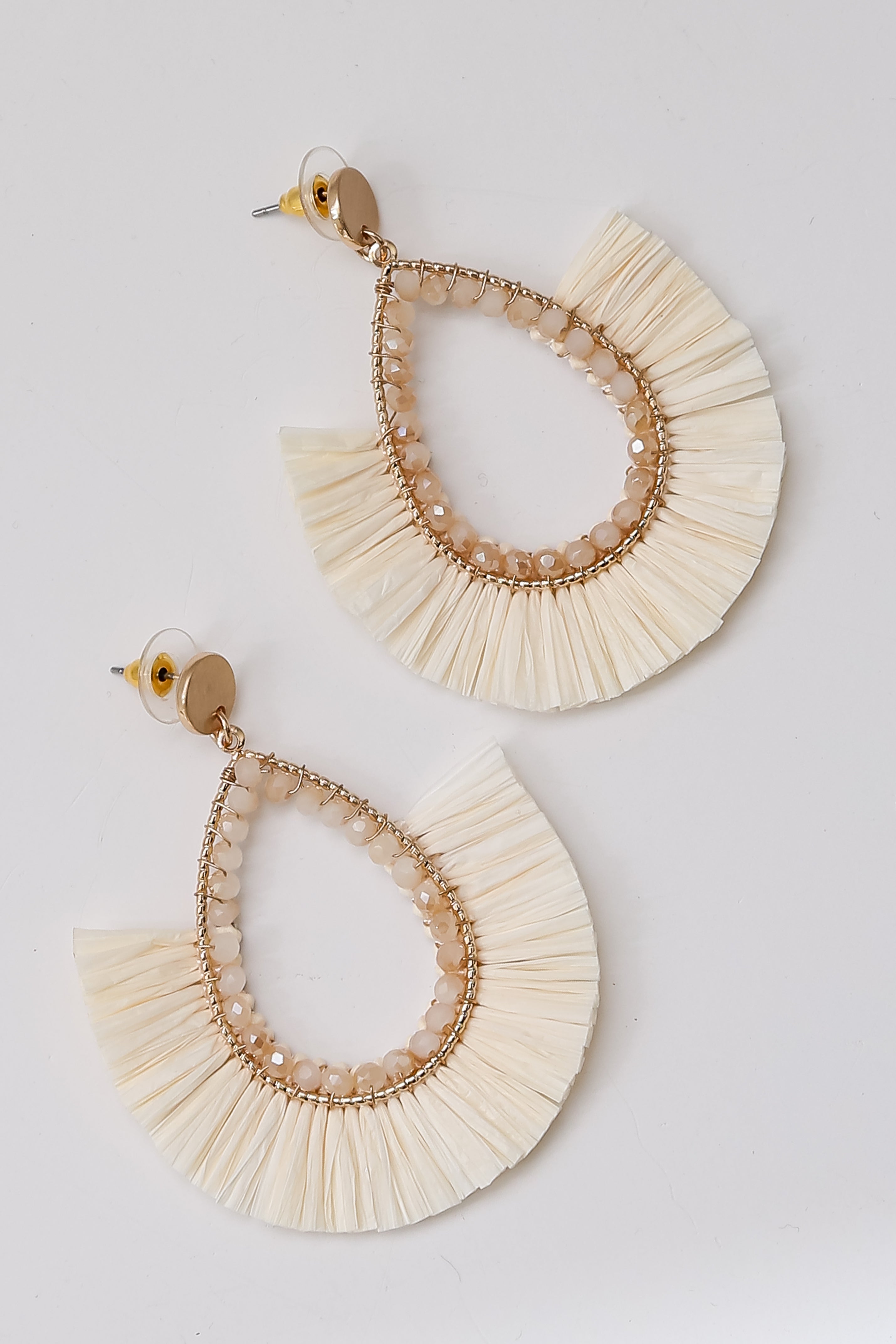 ivory Fringe Statement Earrings flat lay