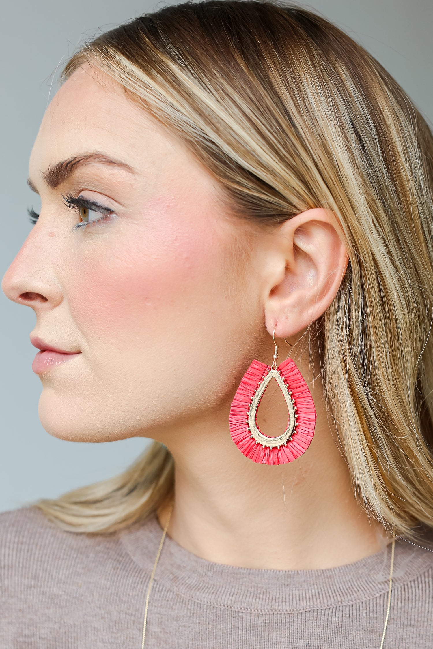 red Fringe Teardrop Earrings on model