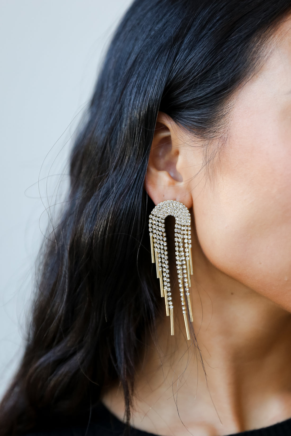 Gold Rhinestone Fringe Earrings on model