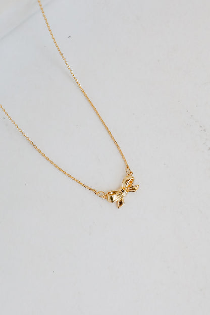 Brooke Gold Bow Charm Necklace