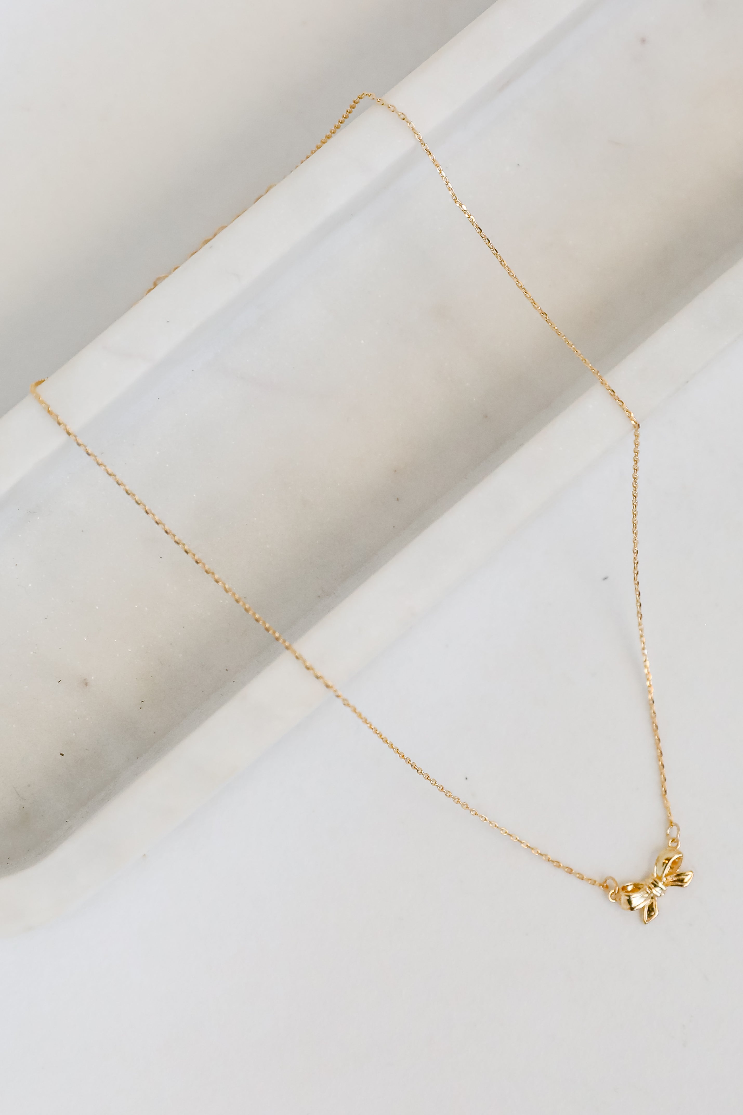 Brooke Gold Bow Charm Necklace