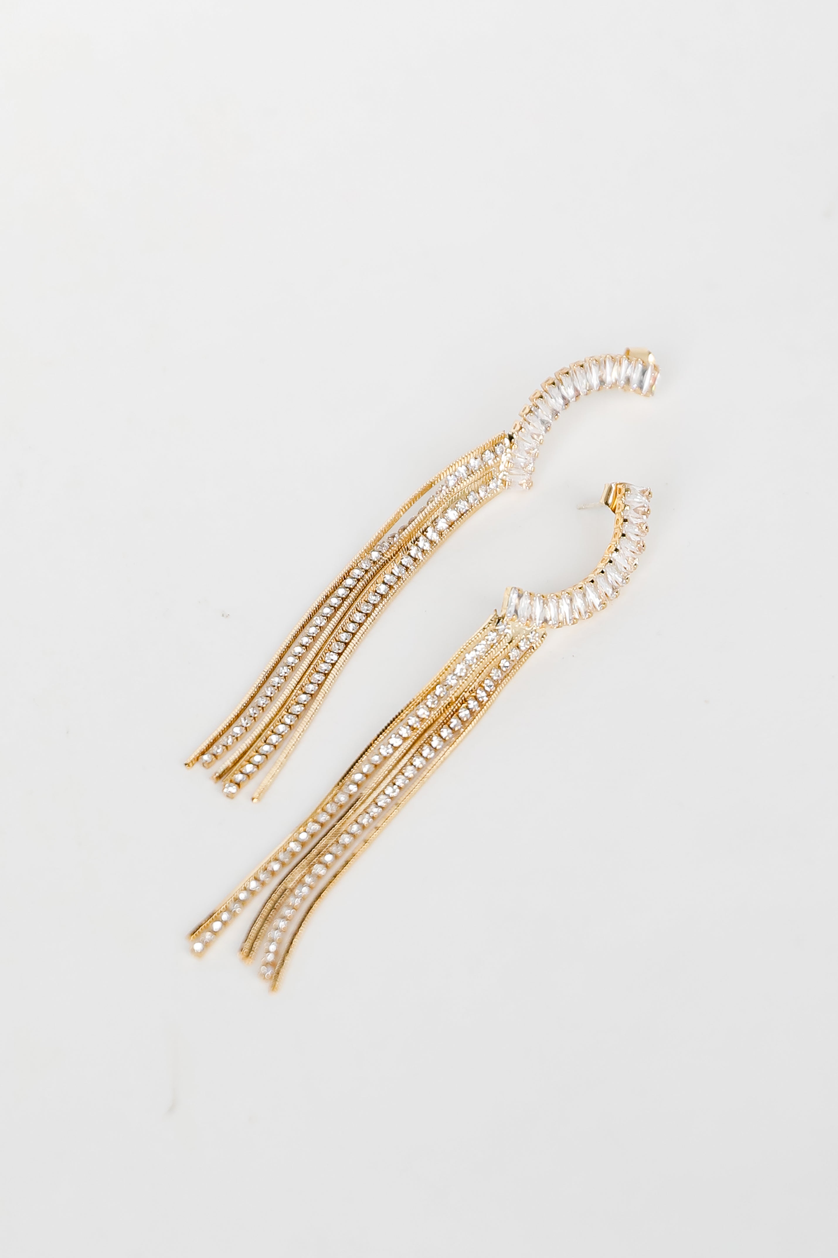 Gold Rhinestone Fringe Earrings flat lay