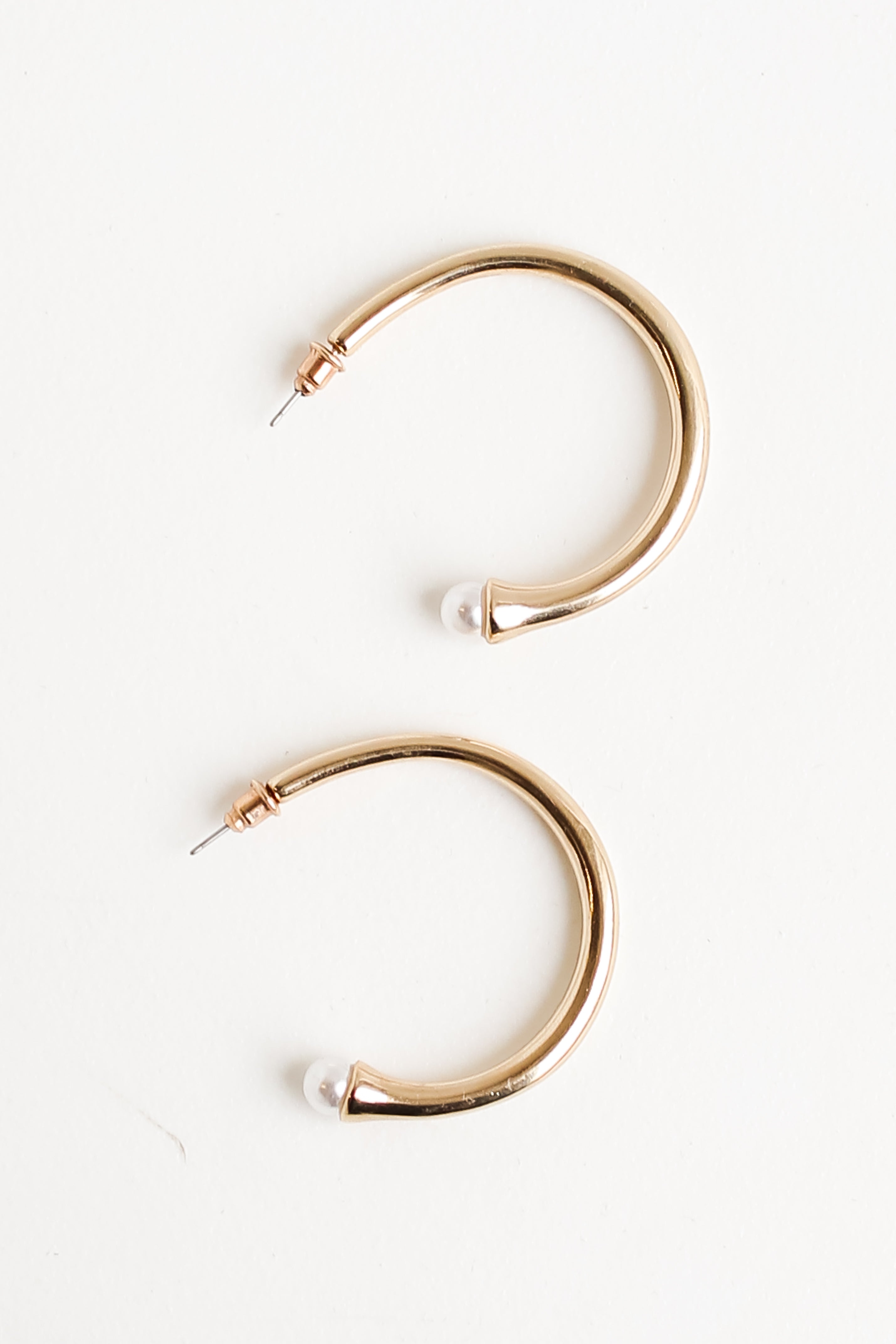 Gold Hoop Earrings flat lay