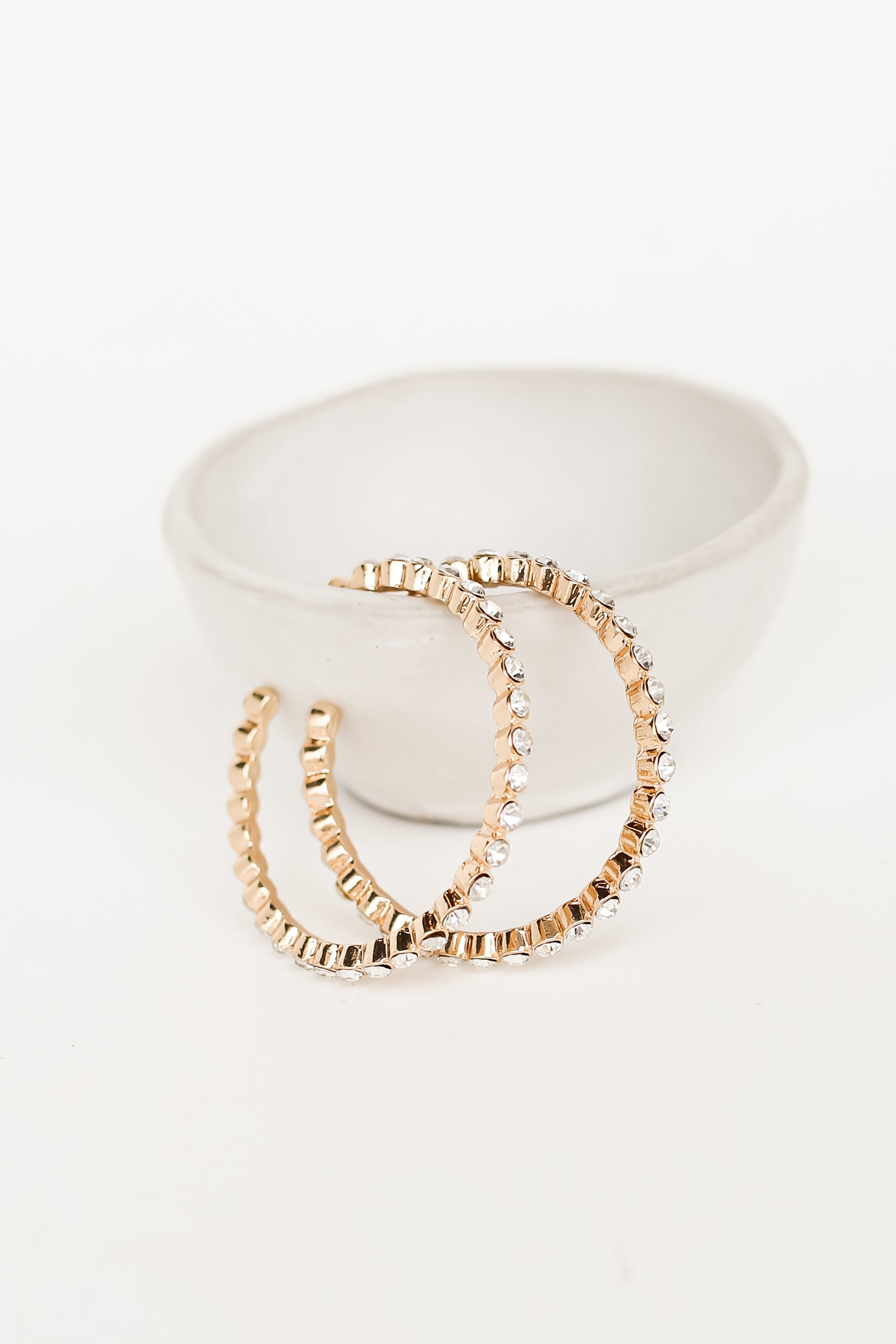 Gold Rhinestone Hoop Earrings flat lay