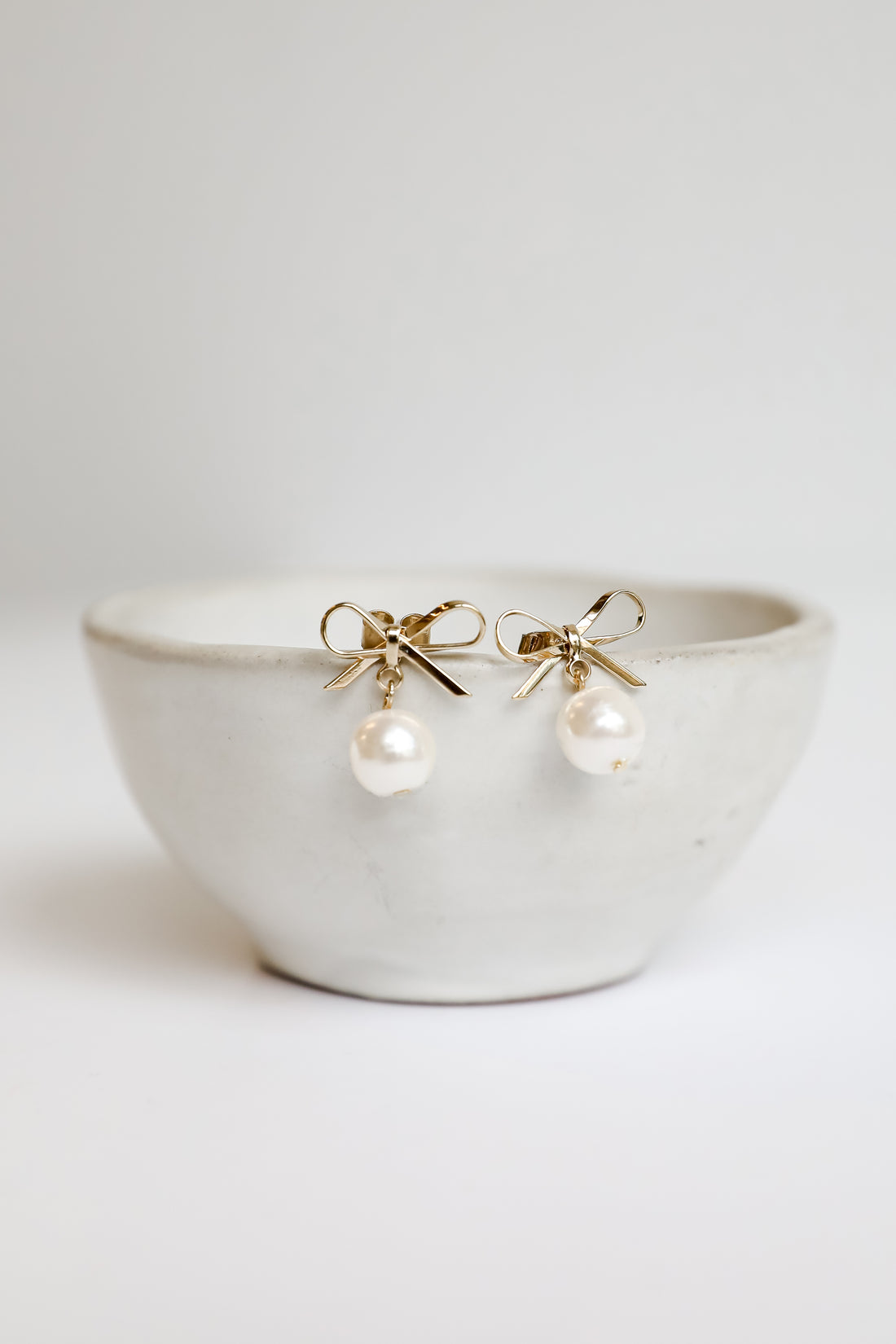 Daphne Gold Pearl Bow Stud Earrings