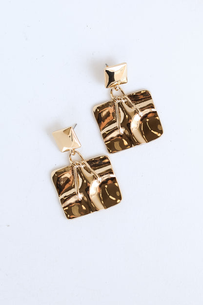 Gold Hammered Drop Earrings flat lay