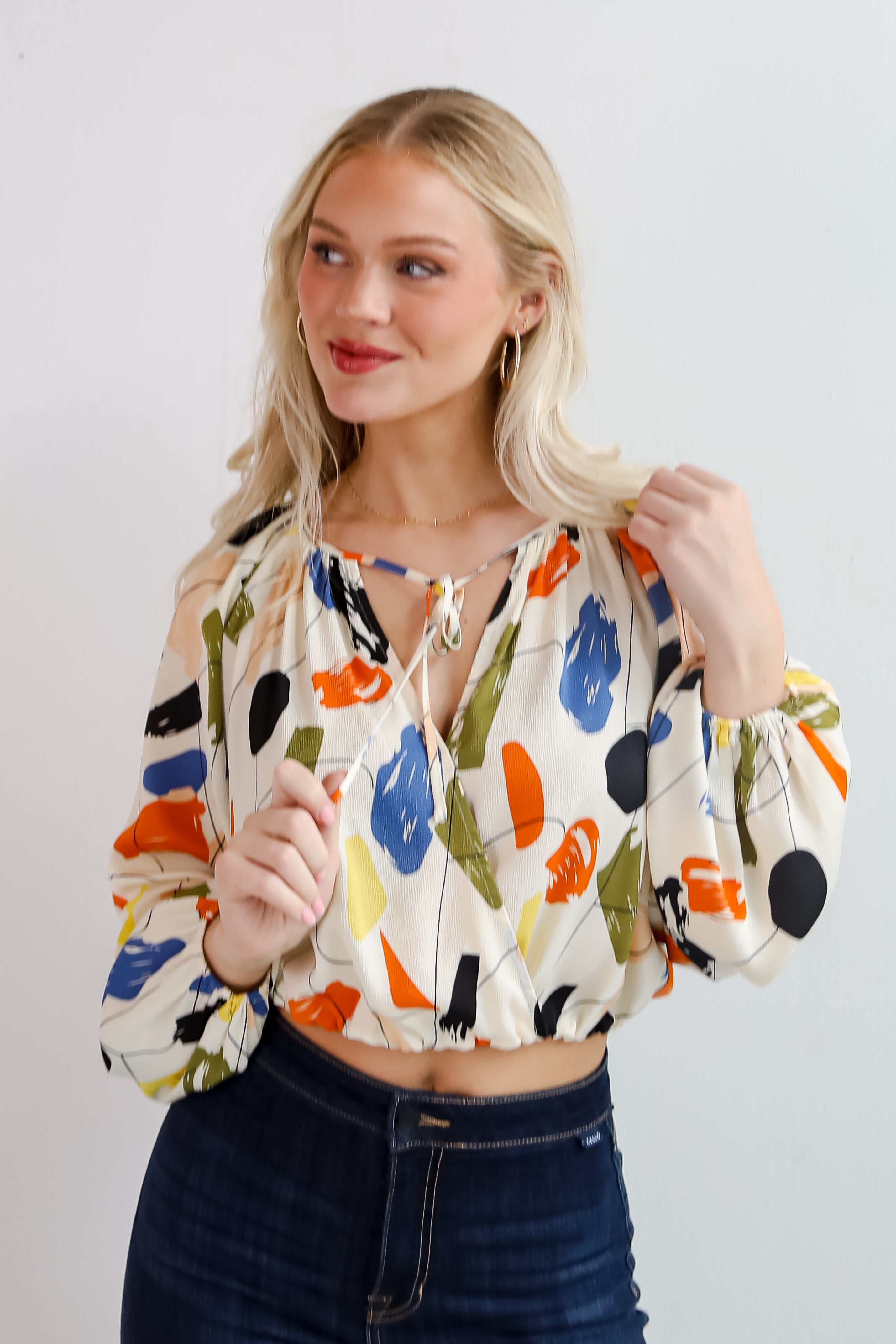 Mesmerizing Energy Cream Surplice Blouse