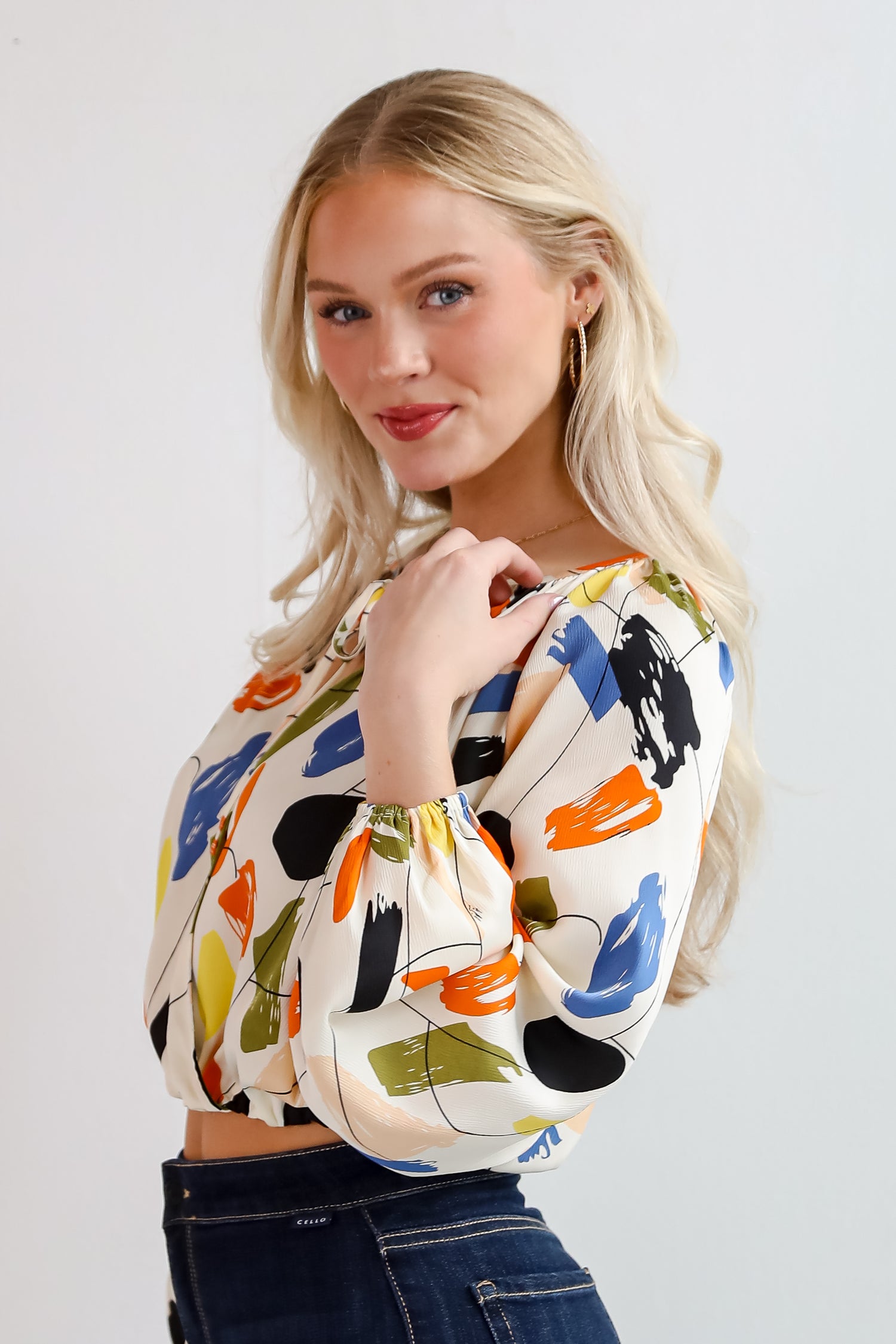 Mesmerizing Energy Cream Surplice Blouse