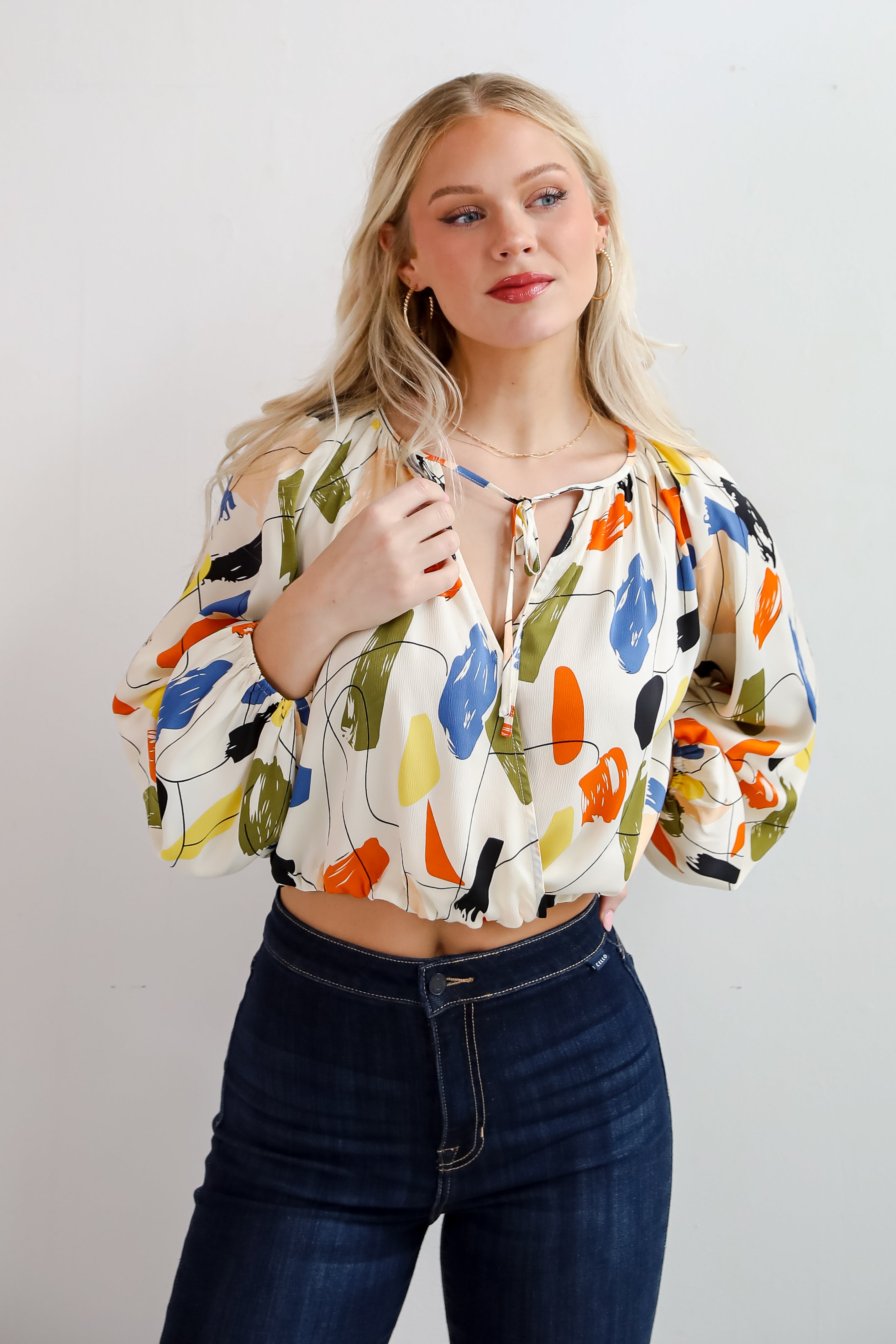 Mesmerizing Energy Cream Surplice Blouse