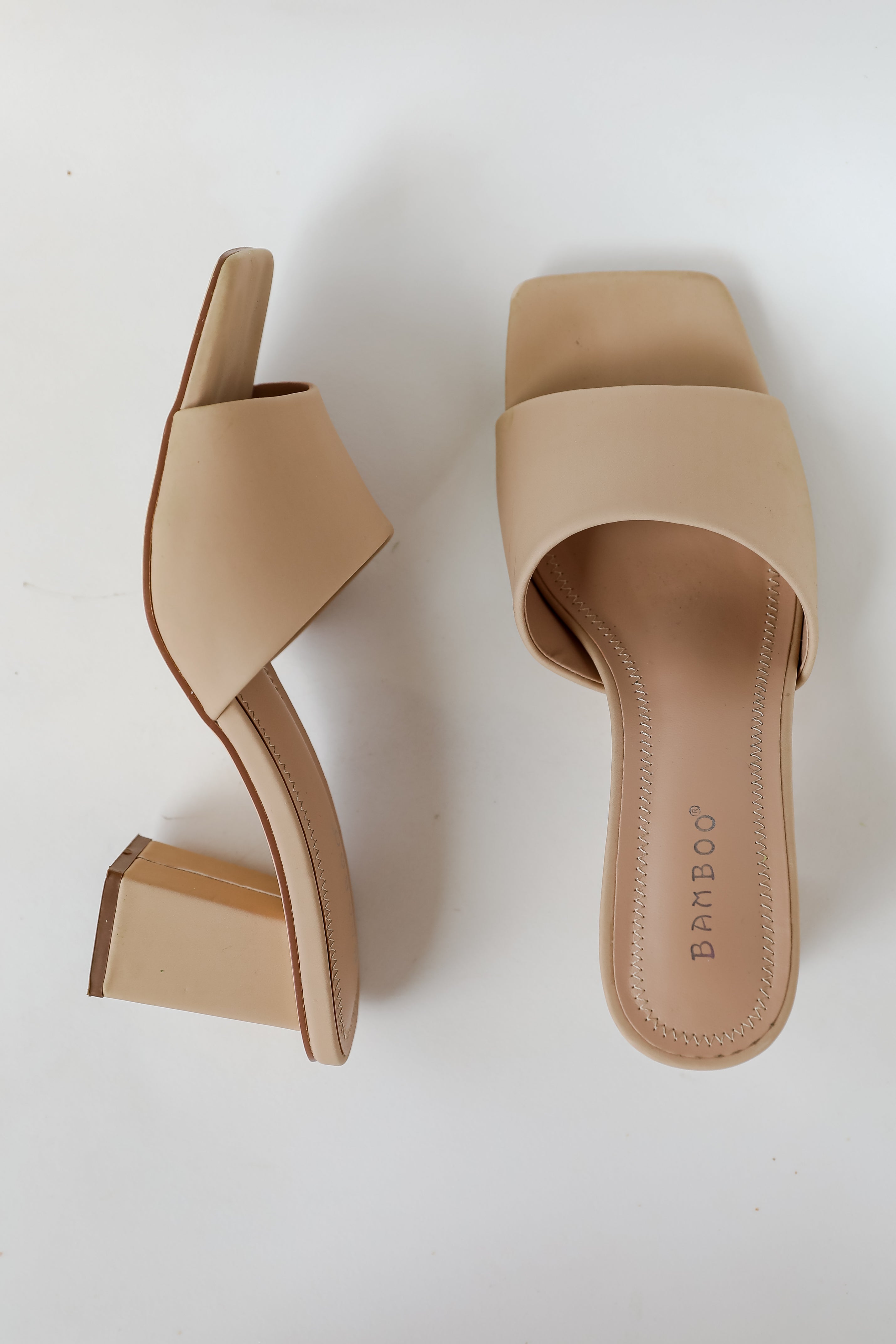 Elegant Elevation Nude Slide Heels