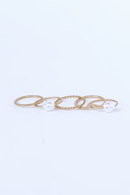 Gold Pearl Ring Set flat lay