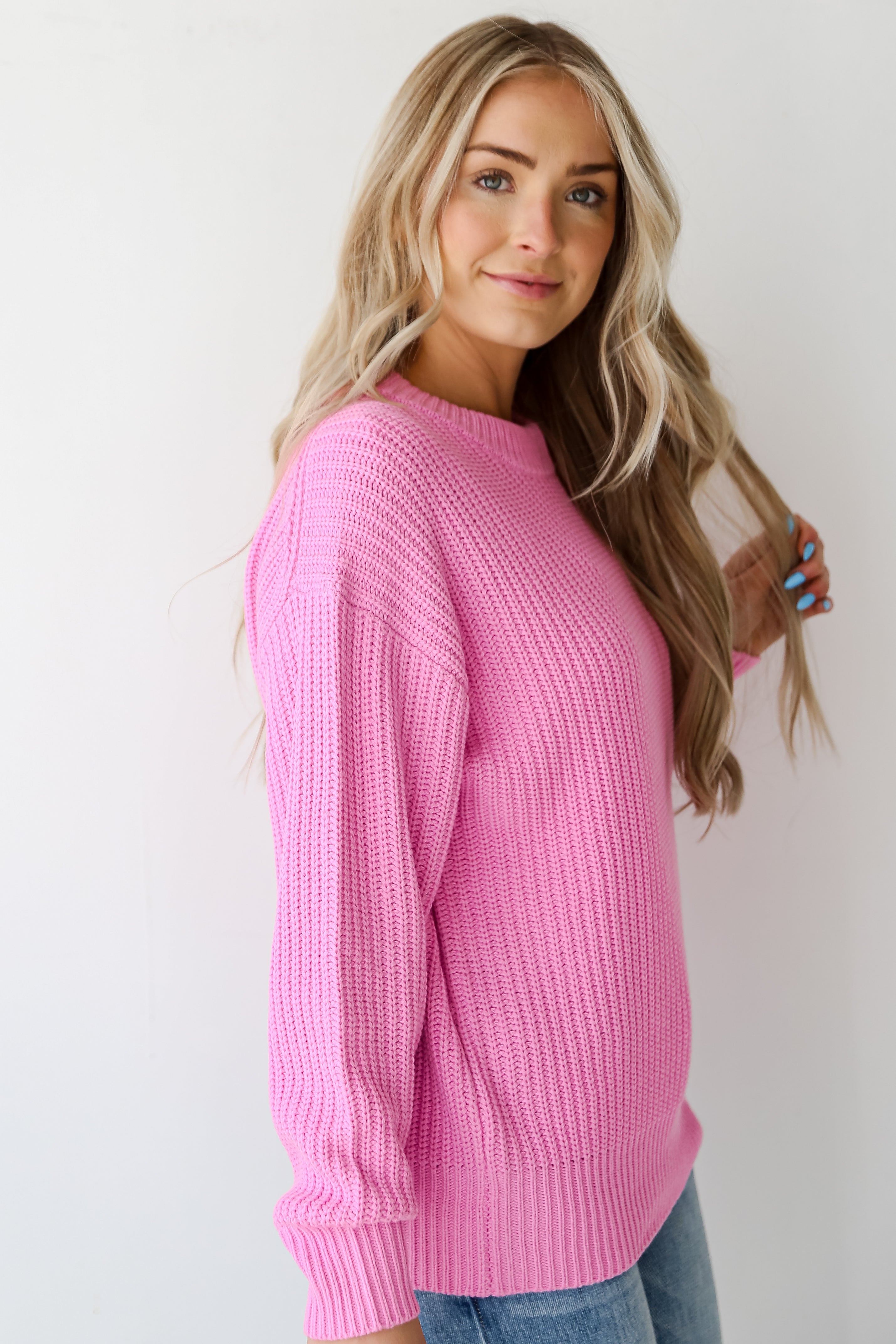 bright pink sweater