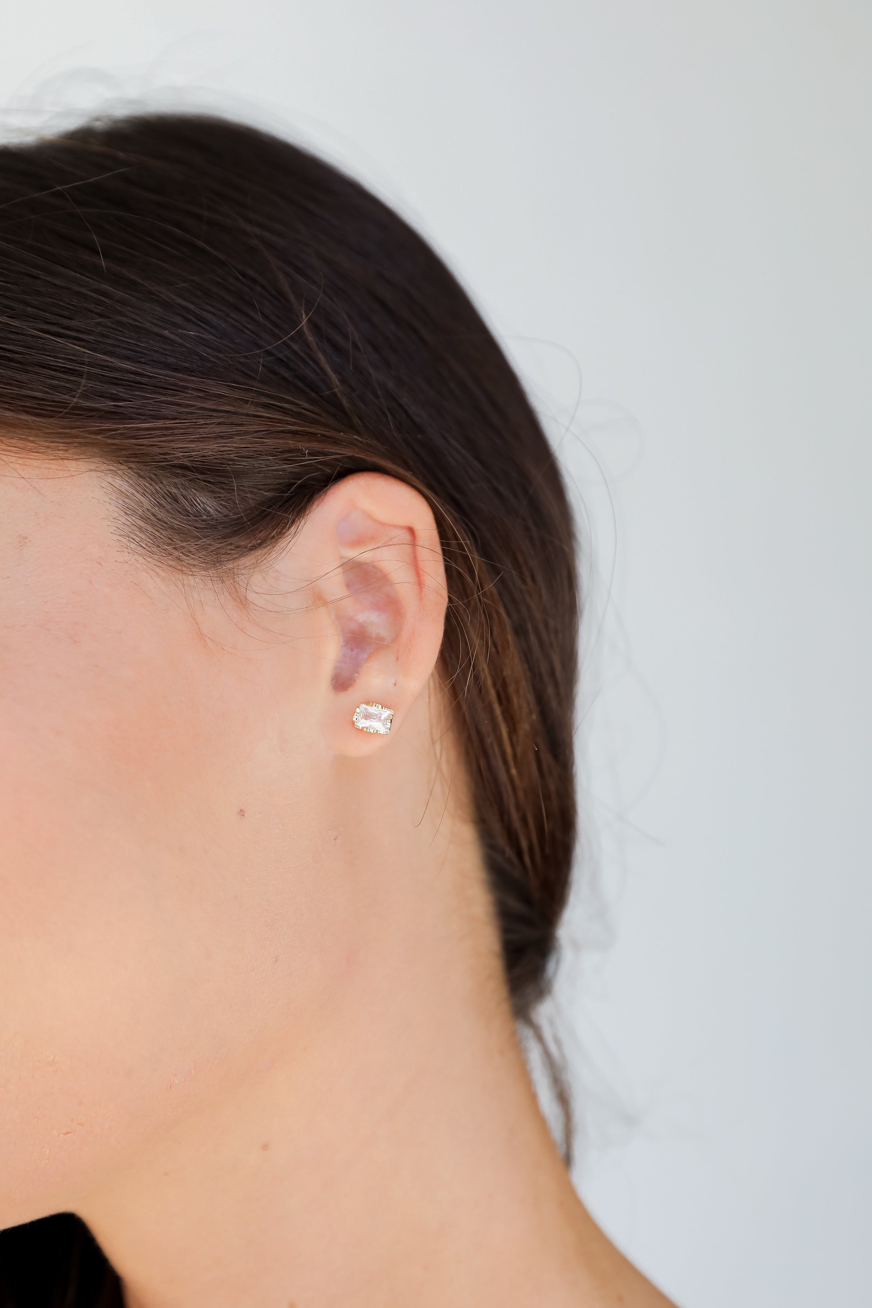 Gold Gemstone Stud Earrings on model