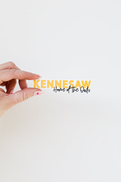 Kennesaw Home Of The Owls Sticker flat lay