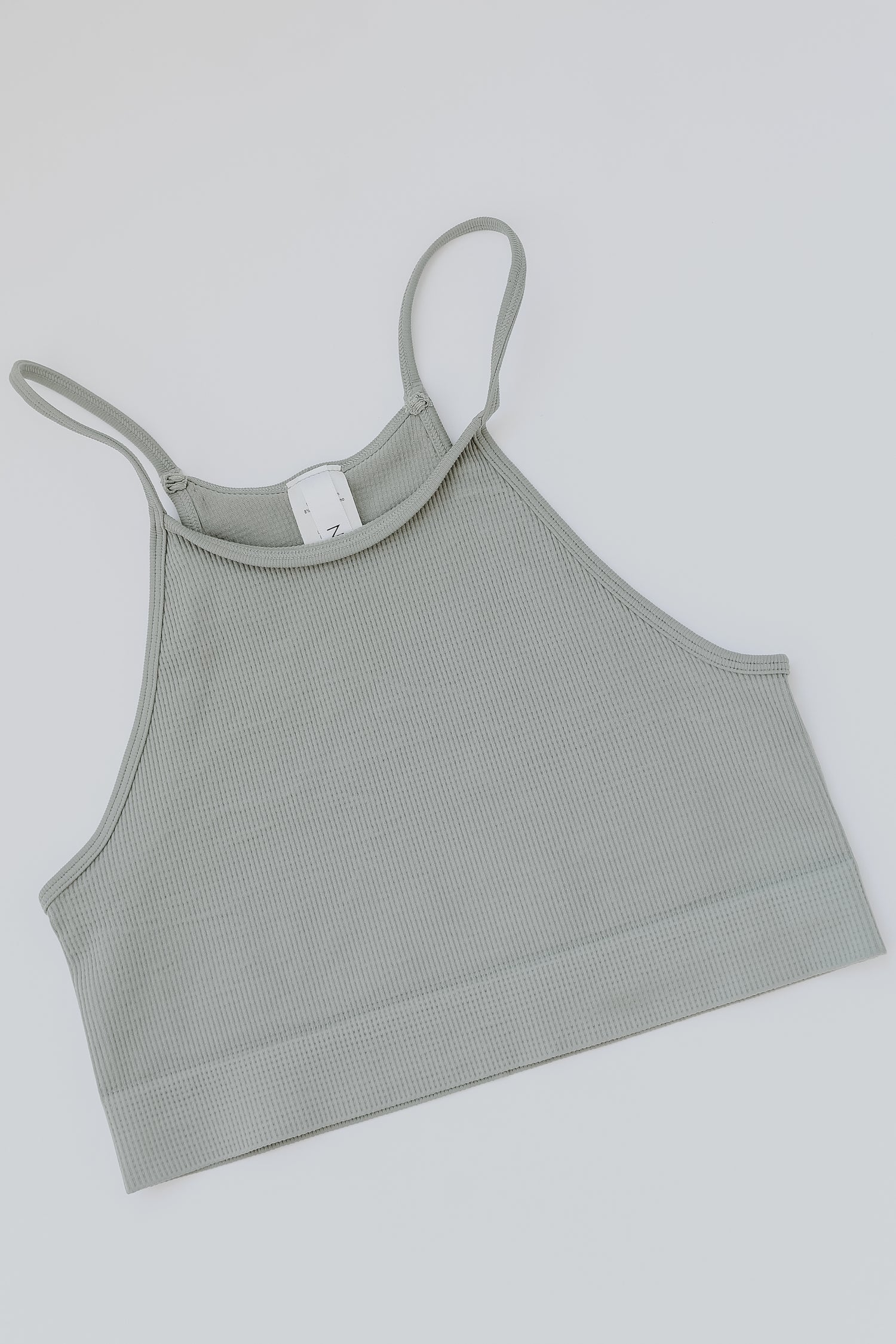 Seamless Cropped Ribbed Tank in sage flat lay