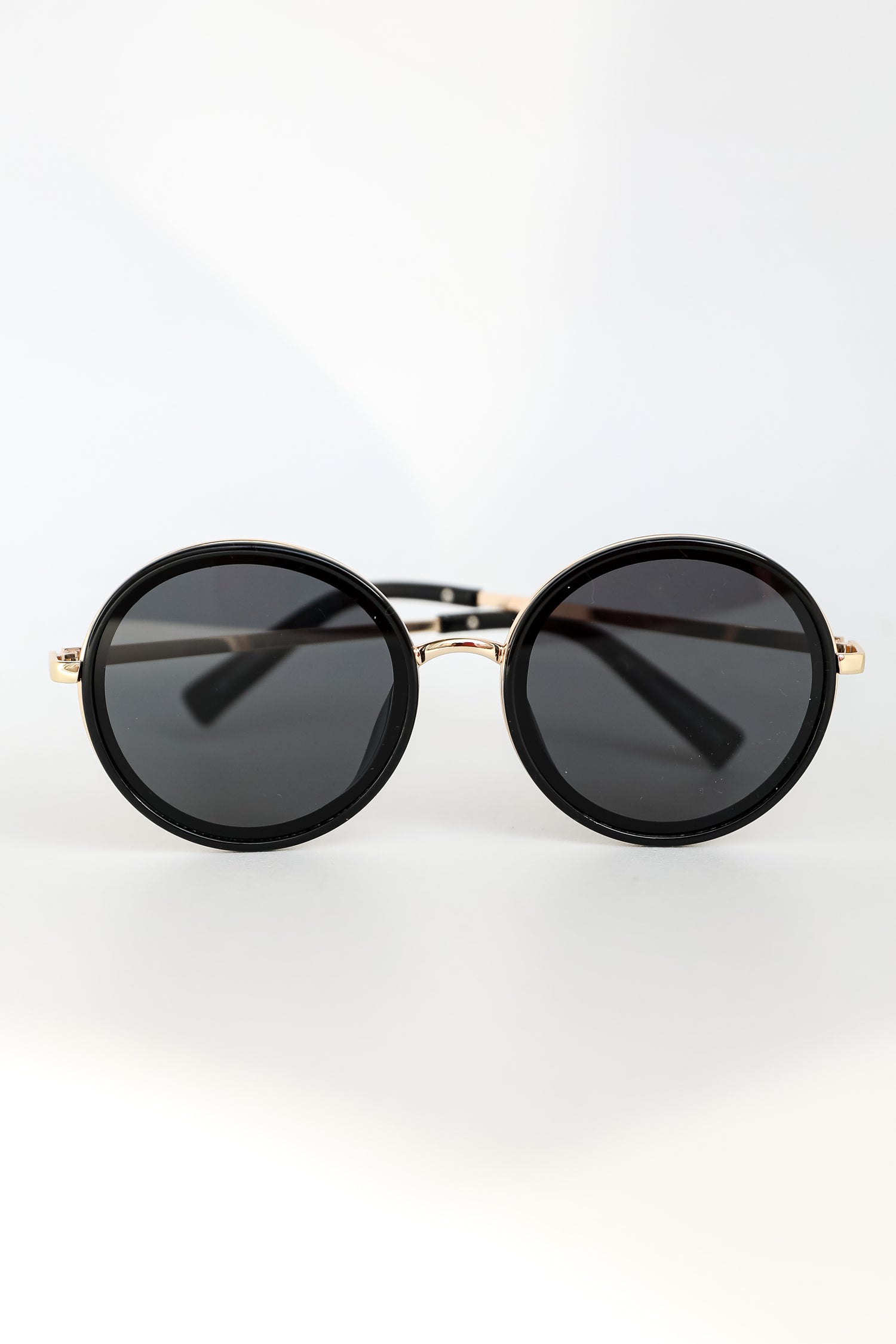 black Circle Sunglasses flat lay